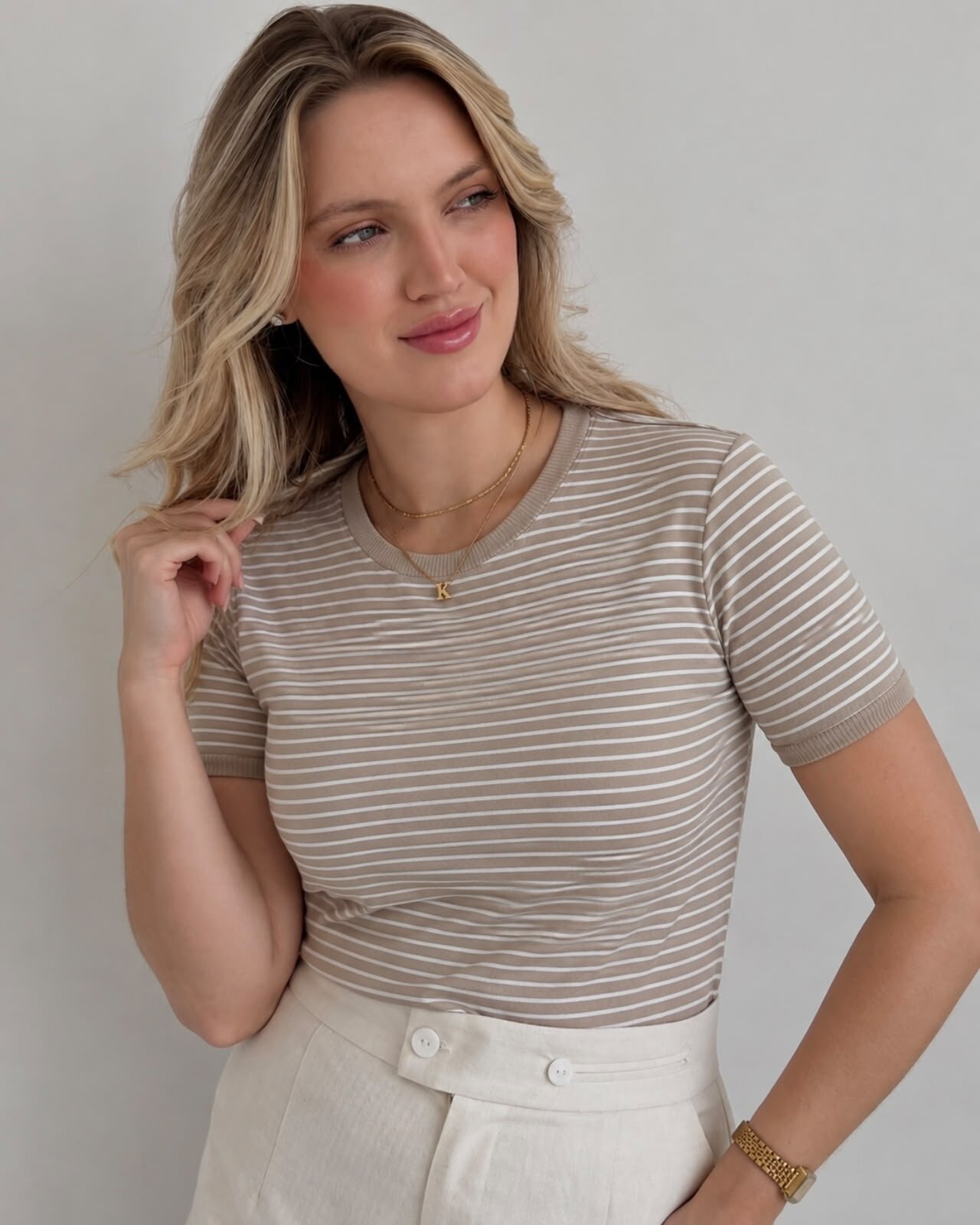 Blusa de malha Listrada Bege